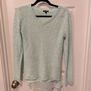 Light green sweater with sequins